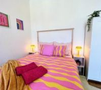 Double bed with nightstand lamps