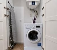 Laundry area with washing machine
