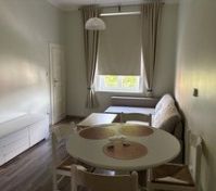 Dining area with sofa