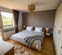 Cozy bedroom with double bed