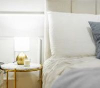 Bed with nightstand lamp