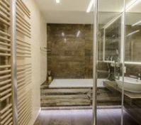 Bathroom includes of large bath, shower, toilet, washbasin and huge LED mirror. Towels and soup is included.