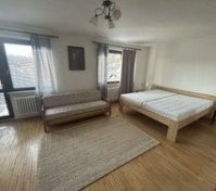 Bright bedroom with double bed