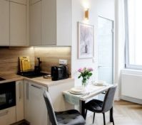 Kitchen with dining table and window