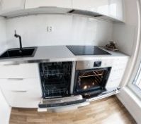 Kitchen with dishwasher and oven
