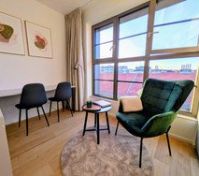 Bright sitting area with city view