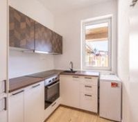 Modern kitchen with oven and washer