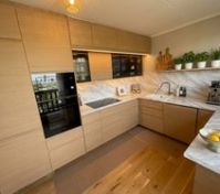 Modern kitchen marble countertops wood cabinets