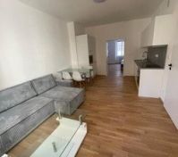 Spacious living room with kitchen