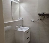 Clean bathroom with toilet and sink
