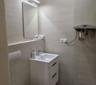 Clean bathroom with toilet and sink
