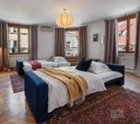Spacious bedroom two sofa beds