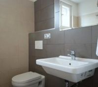 Modern bathroom with toilet and sink