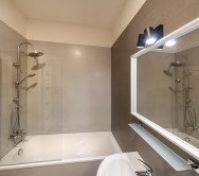 Bathroom with bathtub & shower, toilet, bidet