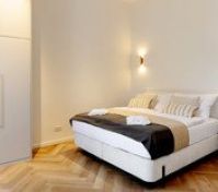 Double bedroom with wardrobe and lighting