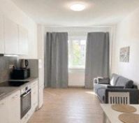 Open plan kitchen living dining area