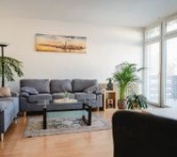 Bright living room with sofa