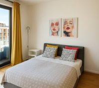 Bright bedroom with yellow curtains