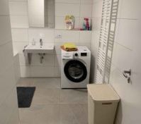 Bathroom with washing machine
