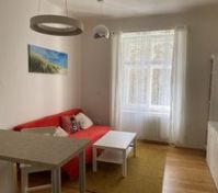 Living room with red sofa