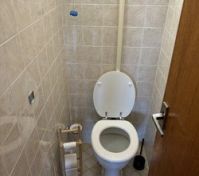 Separate toilet room tiled