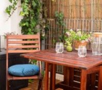 Terrace table with flowers closeup