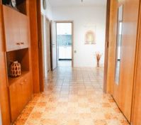 Hallway with wooden cabinets