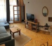 Living room with TV and kitchenette