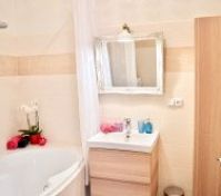 Bathroom with shower and bath, we provide fresh towels.