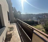 Sunny balcony with garden view