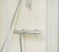 Shower thermostat control detail
