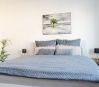 Bright bedroom with double bed
