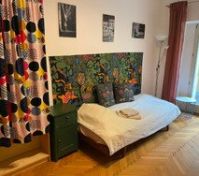 Bed with colorful headboard design