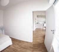 Bedroom view toward kitchen area