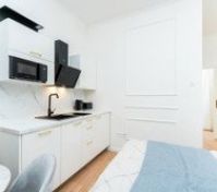 Kitchenette with marble counter