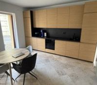 Modern kitchen with dining area
