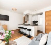Living room with kitchen bar stools