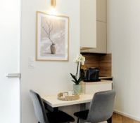 Compact dining table and kitchenette