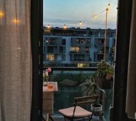 Cozy balcony with string lights evening