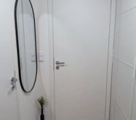 Hallway with oval mirror
