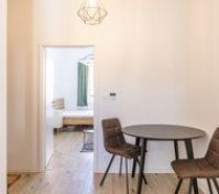 Dining area open to bedroom