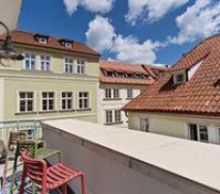 Balcony with rooftop neighborhood view