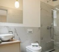 Marble bathroom with glass shower