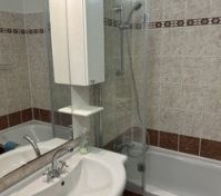 Bathroom with tub and shower