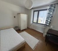 Bedroom with wardrobe and desk