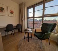 Sitting area with large windows