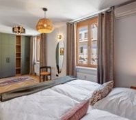 Bedroom with green wardrobe mirror