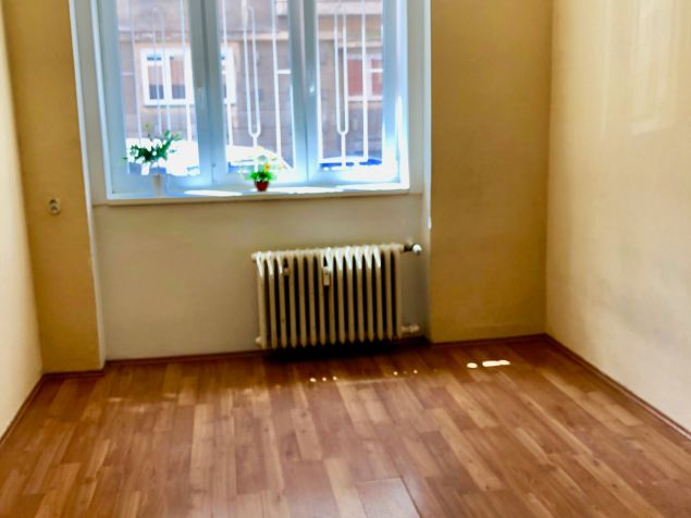 Pokoj s kuchyňským koutem