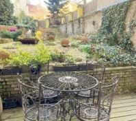 Garden terrace with iron furniture