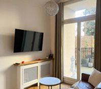 Living room with TV and terrace